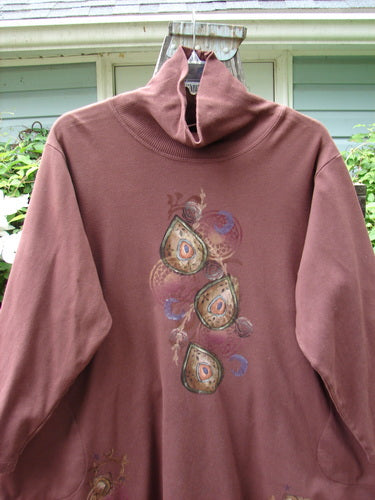 Barclay Interlock Turtleneck Pullover Tunic Top Celtic Paisley Sepia Size 2, featuring a ribbed turtleneck, side entry pockets, banded hem, and draw cord back in cozy fleece fabric.