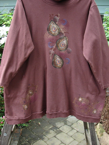Barclay Interlock Turtleneck Pullover Tunic Top Celtic Paisley Sepia Size 2, featuring long sleeves, ribbed turtleneck, side entry pockets, and banded hem in thick, cozy fleece fabric.