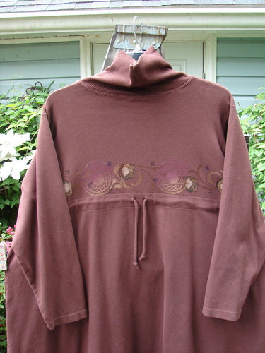 Barclay Interlock Turtleneck Pullover Tunic Top Celtic Paisley Sepia Size 2, featuring a ribbed turtleneck, A-line shape, side entry front pockets, and Celtic paisley design on cozy double-layered fleece fabric.