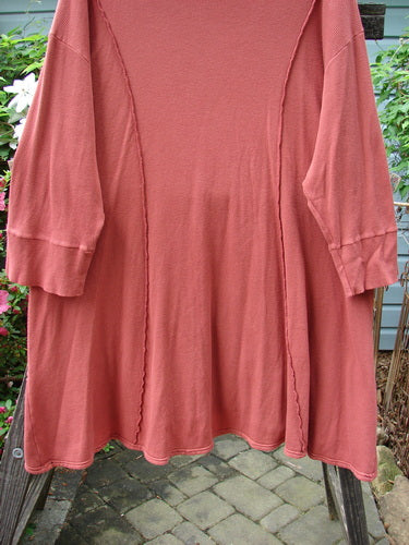 Barclay Thermal Quad Drop Pocket Tunic Dress Unpainted Brick Size 2 displayed on a rack, featuring a double-layered turtleneck and widening hem with four drop pockets, showcasing exterior curved stitchery.