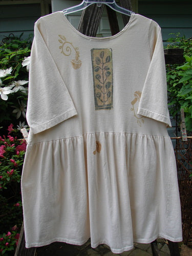 1994 Flower Garden Dress Sun Garden Tea Dye Altered Size 2 features a white cotton jersey with a floral design, scooped neckline, drop waist, and generous folds. Perfect for garden parties.