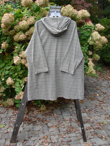 Striped Hooded Pocket Pullover on a stand, showcasing an oversized hood, A-line shape, and elastic-topped pockets from Bluefishfinder's 2000 Resort Collection.
