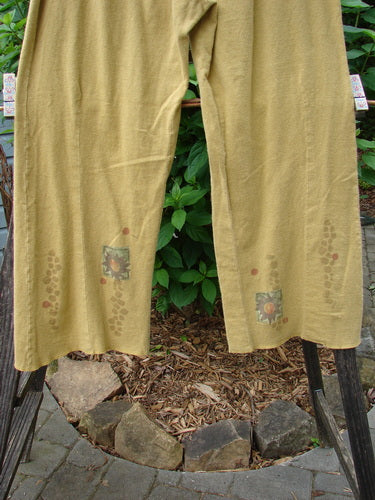 2000 Hemp Cotton Archive Pant Sun Gold Altered Size 0 displayed on a rack, showcasing its elastic backing, paneled front, belled legs, and slight lettuce-edged hemline.