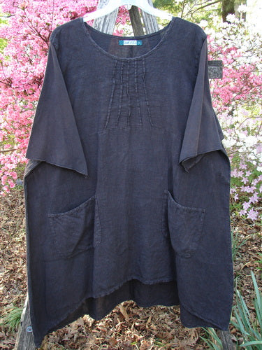 Barclay Linen Cotton Sleeve Milkmaid Dress Unpainted Black Noir Size 2 features a loose fit, round neckline with pintucks, elbow-length sleeves, empire waist, diagonal patch pockets, and a varying hemline.