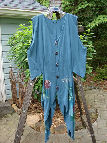 Barclay Calligrapher's Vest Asian Inspiration Deep Tealen Size 2 displayed hanging on a wooden ladder, showcasing its unique shape, deep V neckline, vintage buttons, and detailed lines.