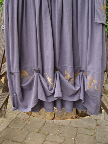 1996 Constellation Dress Butterfly Purple Martin Size 1 displayed on a wooden ladder, featuring an adjustable hemline with loops and buttons, a gathered full skirt, and a scooped neckline.