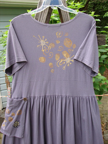 1996 Constellation Dress Butterfly Purple Martin Size 1, featuring gold designs, adjustable hemline with loops and buttons, deeper scooped neckline, mega gathered full skirt, and butterfly-themed paint accents.
