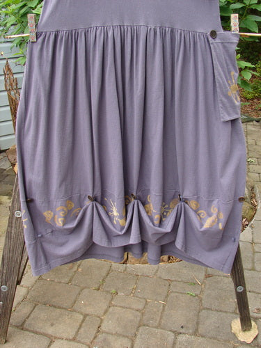 1996 Constellation Dress Butterfly Purple Martin Size 1 on rack, featuring adjustable hemline, rear buttons, mega gathered full skirt, removable pocket, deeper scooped neckline, and butterfly-themed paint.