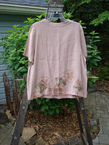 1998 Botanicals Robin's Top Bee Mallow Size 0 displayed on a wooden ladder, featuring dual front pockets, tiny buttons, and garden-themed design, showcasing the vintage charm of BlueFishFinder.com.