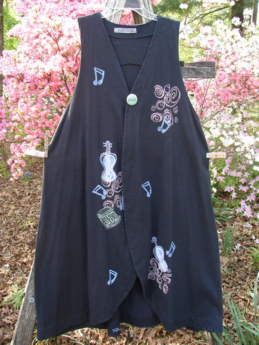 1996 State Fair Vest Music Festival Storm Size 1 features whimsical music-themed motifs, deep V neckline, single button closure, and wide A-line shape. Displayed outdoors, highlighting its unique design and vintage appeal.