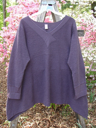 Barclay Patched Crepe Cross Over Tunic Top Diamond Brum Size 1, featuring a V-neckline with overlapping detail, asymmetrical hem, and wide cuffs, displayed outdoors, embodying vintage Blue Fish Clothing style.