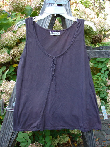 Barclay Batiste Decora Tiny Tank Unpainted in Deep Burgundy Size 1, displayed on a hanger with a vertical neckline tie and diagonal insert, showcasing its lightweight cotton batiste material.