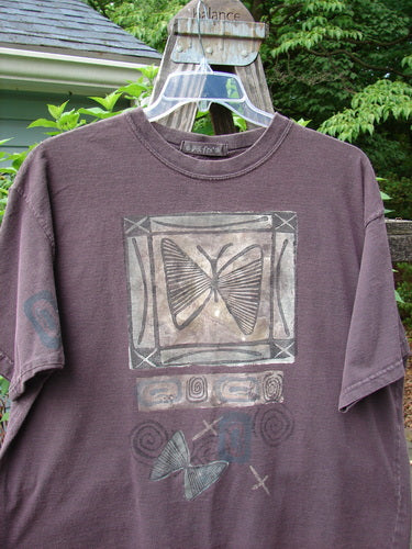 1995 Short Sleeved Tee Butterfly Madderlake Altered Size 2, featuring a detailed butterfly illustration on organic cotton with drop shoulders and a thicker ribbed neckline for a slimmer, shorter fit.