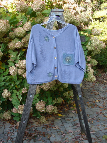 1995 Cotton Rayon Short Sleeved Cardigan Sweater with colorful buttons and friendly garden critter theme paint.