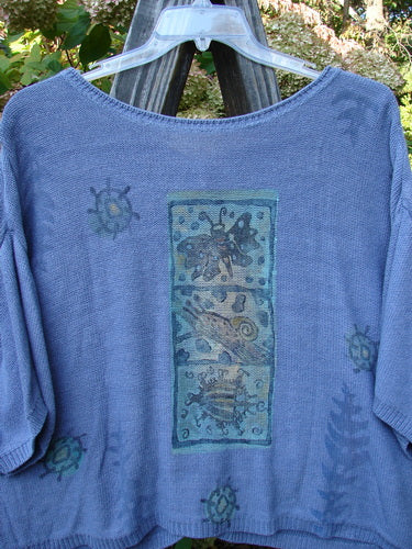 1995 Cotton Rayon Short Sleeved Cardigan Sweater Friendly Garden Dusk Mélange Size 3 featuring colorful buttons, critter theme paint, and ribbed neckline with wider short sleeves.