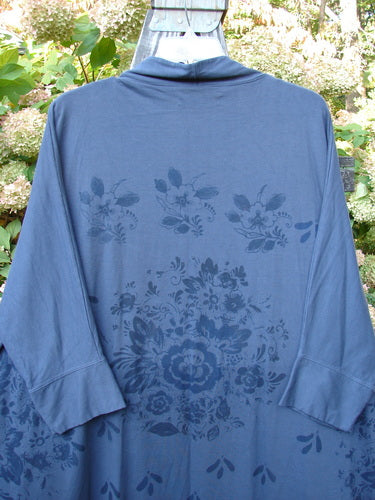 Barclay Bamboo Dolman Day Jacket in Navy with Vintage Floral Design, featuring an open front, drop pockets, cuffed sleeves, and unique hemline. Made from a soft bamboo organic cotton blend.