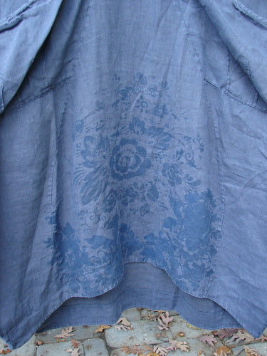 Barclay Linen Rear Tab Pocket Dress in Dusk Florals Dusty Navy Size 1, featuring floral design, wider neckline, pleated sleeves, and angular pockets, showcasing light wear and average fade in the image.