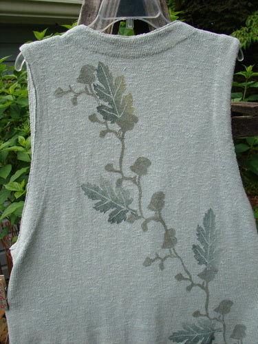 1998 Botanicals Sprig Vest River Altered Size 1 featuring a grey tank top with a leaf design, three oversized handmade stoneware buttons, deep V neckline, ribbed and V knit textures, and delicately stitched loop closures.