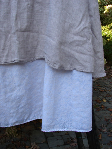 Barclay Linen Fold Over Two Tier Skirt Translucent Daisy Mallow Size 1, featuring a full paneled waistline and fluttery upper layer, perfect for pairing with spring pastels.