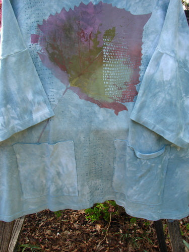Barclay NWT Cotton Lycra Writer's Pocket Pullover Sweatshirt Leaf Mottled Asper OSFA, loose-fitting with abstract leaf motif, seamless design, draped outdoors with dual pockets, embodying BlueFishFinder's vintage creative freedom ethos.