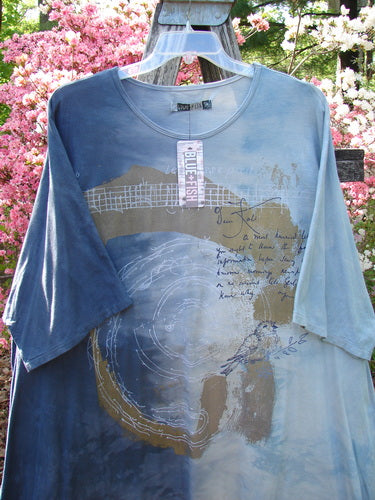 Barclay NWT Art Tee in Mottled Ink Sky Bronze, featuring circular brush-stroke patterns, handwritten text, and a small bird illustration, displayed on a hanger with a Blue Fish tag.