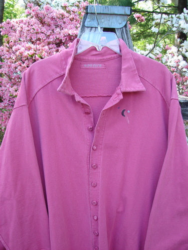 1997 Work Jacket Tiny Moon Geranium OSFA, showcased outdoors, features a heavy cotton fabric, long sleeves, button-down front, and deep side pockets, embodying Bluefishfinder.com's vintage style and creative individuality.