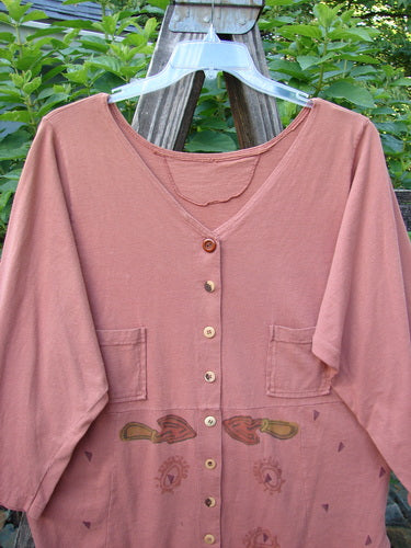 1994 Grasshopper Coat Garden Tools Gourd Size 1 displayed on a hanger, featuring a wide V-neckline, upper pockets, buttoned vents, and a shirttail back hemline.