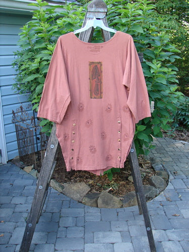 1994 Grasshopper Coat Garden Tools Gourd Size 1 displayed on a wooden stand, featuring a wide V neckline, upper pockets, front hemline, shirttail back, and garden tool-themed paint.