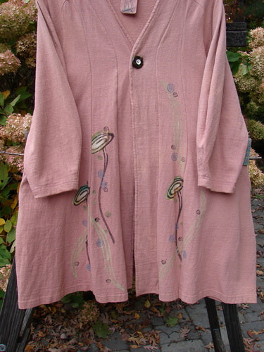 1996 Reprocessed Spring Rain Jacket Bud Time Altered Petal OSFA: A pink coat with a flower design, vintage closure, A-line shape, deep side pockets, and detailed paint accents.