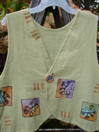 1997 Troubadour Vest with Button, Blue Fish Gal Mellon Size 1: Organic cotton vest featuring a deep V neckline, rounded front hemline, and abstract fish gal theme paint.