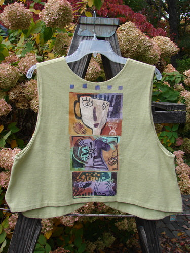 1997 Troubadour Vest Blue Fish Gal Mellon Size 1: A green shirt with a picture of an abstract fish gal theme paint and the Blue Fish patch.