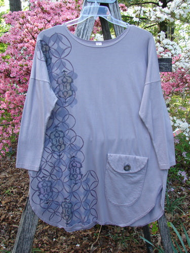 Barclay Long Sleeved Pop Top Celtic Spirograph Stone Size 1 features a rounded neckline, oversized pocket with button, and floral/geometric pattern. Ideal for vintage Blue Fish Clothing enthusiasts.