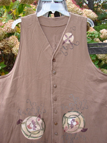 1997 Merchant Vest Floral Spin Mandola OSFA: A brown vest with a design on it, featuring a logo and circular design. Perfect condition, made from organic cotton. A unique piece from the Holiday Collection of 1997.