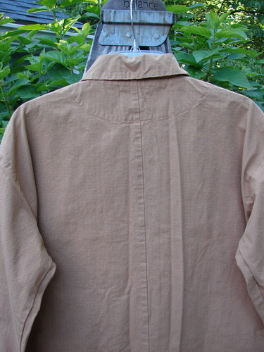 Close-up of the 2000 Parachute Double Button Jacket Floral Carmel Altered Size 1, highlighting the double breast line, metal buttons, cuffed sleeves, and tiny front pockets.