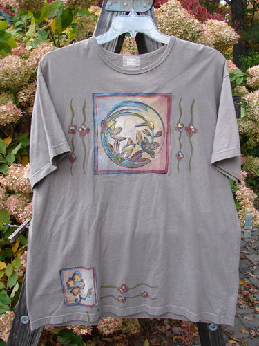 1999 Short Sleeved Tee Circle Bloom Shale Size 1 featuring a Super Circle Bloom theme paint, thinner rolled ribbed neckline, and a straighter shape made from medium weight organic cotton jersey.