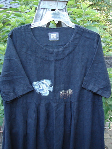 1999 Textured Linen Water Dress Goldfish Raven Size 0, featuring a softly rounded neckline, empire waistline, pleated front, and full sweeping skirt with a goldfish theme, in perfect condition.