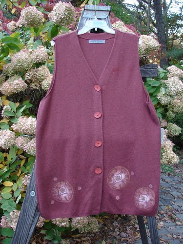 1997 Cashmere Archway Vest with Celtic Wheel design. A soft, flowing vest with four oval buttons, deep V neckline, and ribbed hemline.
