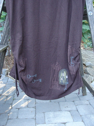 1999 Starlight Dress Celtic Key Deep Burgundy Size 0, featuring a rolled double-layered neckline, lovely sleeve lacings, and side vertical drawcords, showcased in perfect condition and made from mid-weight organic cotton.