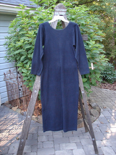 1991 Rib Thermal The Skinny Dress Unpainted Charcoal Altered OSFA displayed on a wooden ladder, showcasing its long sleeves, rounded neckline, and straight linear shape.