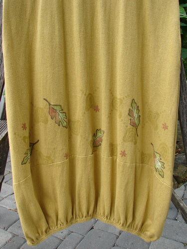 2000 Cotton Hemp Libby Jumper Falling Leaf Gold Altered Size 1, featuring a sophisticated drape with a fall leaf pattern, downward scooped waistline, side pockets, and a bubbled lower shape.
