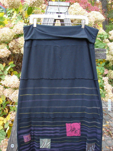 Barclay Patched Thermal Fold Over Pencil Panel Skirt Grid Stripe Black Size 2 hanging on a clothesline, showcasing its fold-over waistline, horizontal stitchery, and tiny patches along the hem panel.