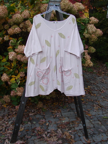 Barclay Double Draw Center Vent Tunic Top Leaf Pink Tile Size 2 featuring a leaf-themed design, rounded neckline, wide sleeves, and double rear drawcords.