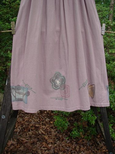 1995 Smocked Skirt Garden Patio Rose Size 2, featuring a detailed flower and butterfly design, flowy full hip measurements, and a charming ruffled top, showcasing Bluefishfinder.com's vintage elegance.
