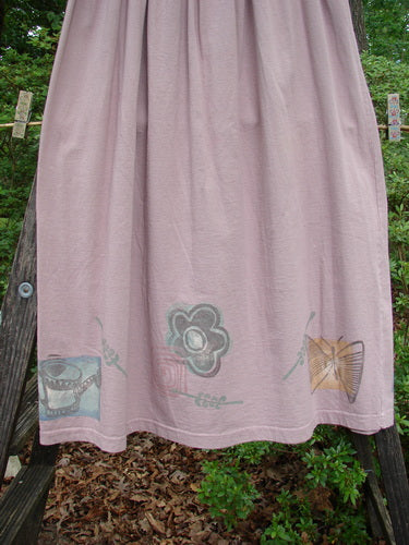 1995 Smocked Skirt Garden Patio Rose Size 2 featuring intricate garden-themed designs, abundant floral patterns, and a smocked waistband, exemplifying vintage Blue Fish Clothing's unique, expressive style.