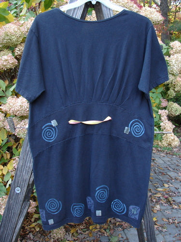 1992 Little Storma Dress Garden Bug Black Small OSFA featuring spiral patterns, deep rounded neckline, gathered top half rear with silk ribbon slits, and vintage patch detailing.