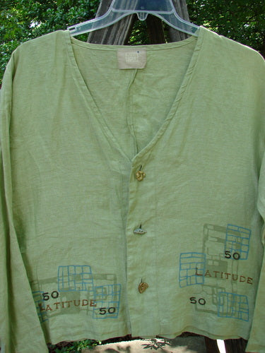 2000 Cross Dye Linen East Side Jacket Latitude Celery Size 0 with unique ceramic buttons, square boxy shape, and vented sides, showcasing a textured green fabric from Bluefishfinder.com.
