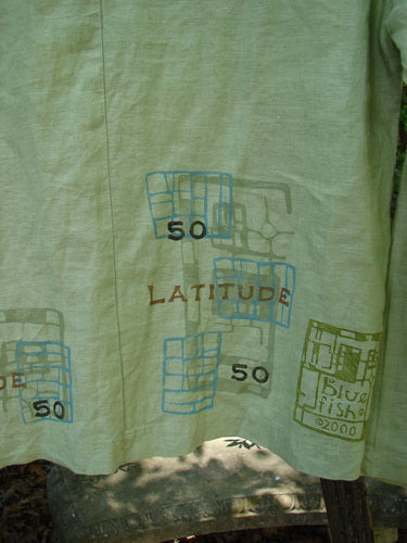 Close-up of the 2000 Cross Dye Linen East Side Jacket Latitude Celery Size 0, highlighting the unique ceramic buttons and boxy shape.