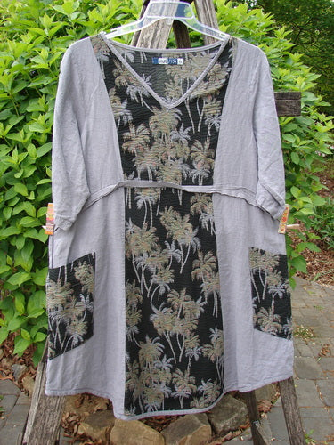 Barclay Linen Pucker Heart and Soul Dress Tropical Black Grey Size 0 displayed outdoors, showcasing its gray sleeves, palm motif front, V-neckline, and contrasting textures, embodying Bluefishfinder.com's unique, expressive style.