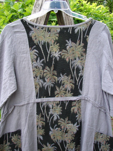 Barclay Linen Pucker Heart and Soul Dress, Tropical Black Grey, Size 0; features a textured linen look, elbow-length sleeves, and a palm-printed panel. A deep V-neckline and contrasting pockets enhance its unique style.
