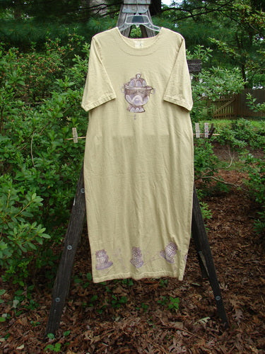 1999 Straight Dress Sugar Bowl Plantain Altered Size 1 on a rack, featuring a rounded paneled neckline and two rounded side-entry pockets, showcasing the signature Blue Fish patch.